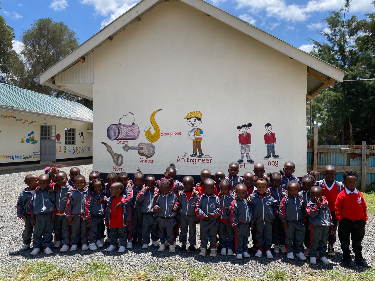 Glama ECDE School pupils together in their school tracksuits